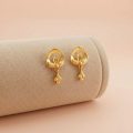 22k gold earrings, minimalist gold jewelry, OVJ Jewels, gold floral drop earrings, Indian gold jewelry online, 22k yellow gold studs, lightweight gold earrings, heritage jewelry Dindigul, everyday wear gold earrings.