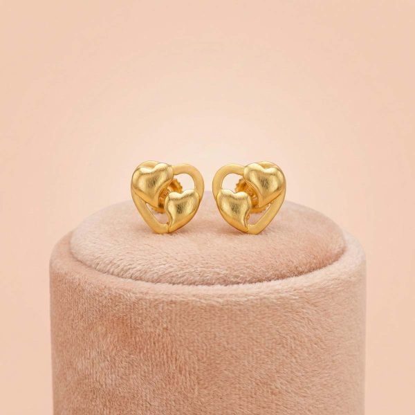 22k gold double heart minimalist stud earrings on pink display stand - OVJ Jewels