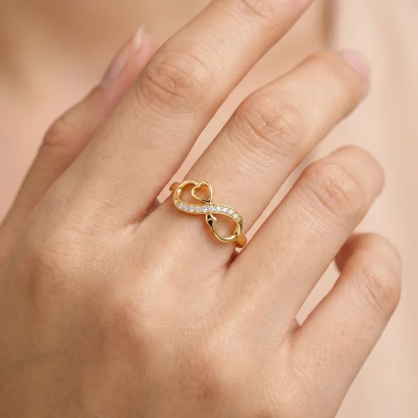 22k gold infinity ring, stone studded gold ring, infinity heart jewelry, minimalist stone ring, OVJ JEWELS, premium gold rings for women, handcrafted gold jewelry, worldwide shipping jewelry