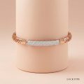18k rose gold minimalist bracelet with diamond pave bar and geometric lattice band by OVJ Jewels.