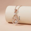 Romantic 18K Gold Twin Heart Diamond Pendant