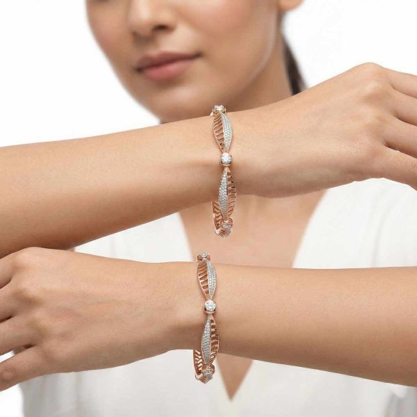 18k Gold Bangles Rose Gold Diamond Jewelry Designer Diamond Kadas OVJ Jewels Bangles Size 2.8 Gold Bangles Luxury Bridal Bangles Real Diamond Gold Bangles Leaf Pattern Gold Jewelry 18k Hallmark Gold Bangles ### Optimized Image File Names Google's image search uses file names to understand what is in the picture. Change the generic "127-25I2768" to these: 18k-rose-gold-diamond-leaf-bangles-ovj-jewels.jpg designer-diamond-studded-gold-kadas-size-2-8.jpg luxury-wedding-gold-bangles-rose-gold.jpg Pro-Tips for Your Product Page: Alt Text: When you upload the image, set the "Alt Text" to: "Pair of 18k rose gold bangles with intricate diamond-encrusted leaf patterns from OVJ Jewels." Specifications: Explicitly list the weight (if known) and the clarity of the diamonds (e.g., VVS-VS) in the product details, as savvy buyers search for those terms. Would you like me to write a longer, more storytelling-style product description to go on the actual page?