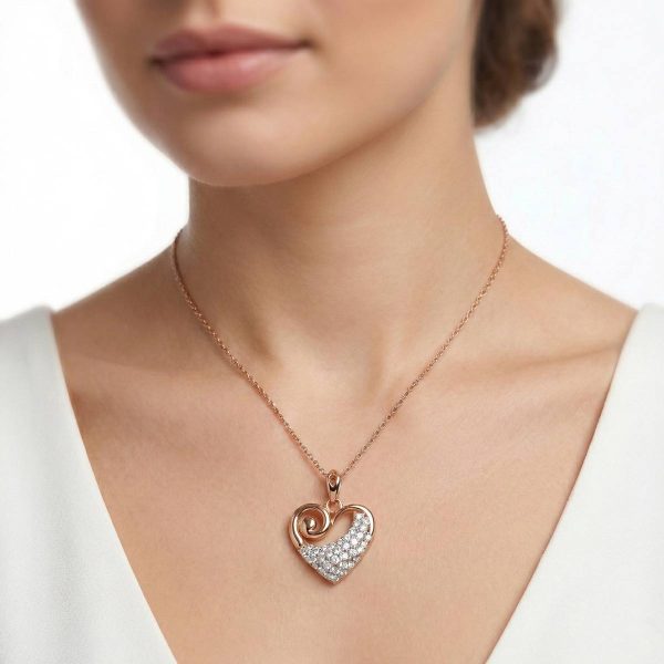18kt gold jewelry online, romantic gold heart necklace for women, everyday wear gold pendant, 2cm gold heart charm, rose gold swirl heart pendant.