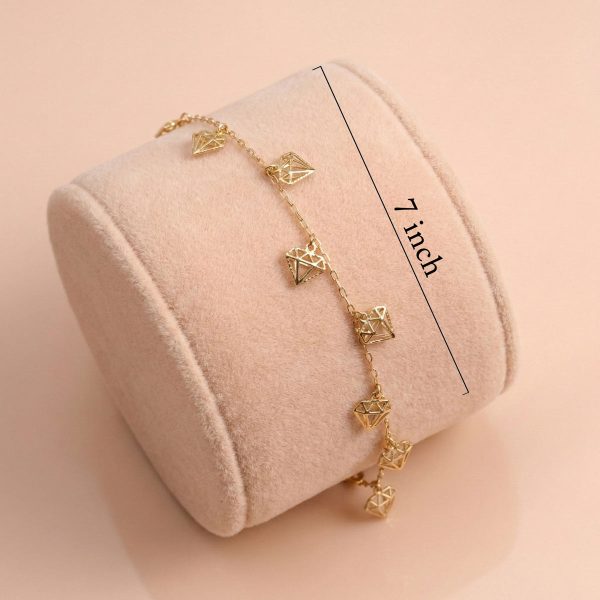 18k gold bracelet, minimalist jewelry, dainty gold charm bracelet, geometric gold jewelry, 18k yellow gold, OVJ Jewels, minimalist gold bracelet for women, diamond cut gold charms, 7 inch gold bracelet, modern gold jewellery.