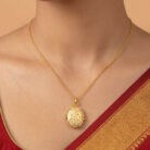 22k gold pendant, gold oval locket, oval pendant design, ladies gold pendant, 22 carat gold jewelry, traditional gold locket, floral gold pendant, designer gold pendant, engraved gold locket, gold necklace pendant, women's gold pendant, antique style gold pendant, oval locket pendant, gold jewelry online, ovj jewels, premium gold pendant