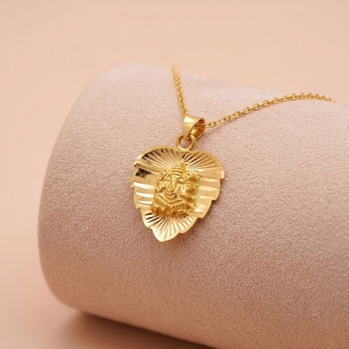 101-25B109 22k gold pendant, gold ganesha pendant, vinayagar pendant gold, ganpati gold pendant, leaf design gold pendant, traditional gold pendant, lightweight gold pendant, ladies gold pendant, stylish gold pendant, designer gold pendant, religious gold pendan