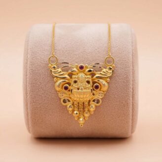 22k gold Lakshmi pendant, gold temple pendant, Lakshmi pendant design, traditional gold pendant, ruby stone pendant, South Indian jewelry, temple jewelry pendant, antique gold pendant, bridal gold pendant, goddess Lakshmi jewelry, women's gold pendant, pure gold pendant, festive jewelry, wedding gold pendant, designer gold pendant