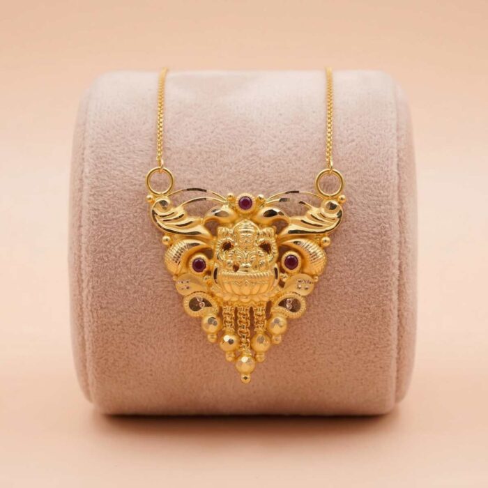 101-26N2435 22k gold Lakshmi pendant, gold temple pendant, Lakshmi pendant design, traditional gold pendant, ruby stone pendant, South Indian jewelry, temple jewelry pendant, antique gold pendant, bridal gold pendant, goddess Lakshmi jewelry, women's gold pendant, pure gold pendant, festive jewelry, wedding gold pendant, designer gold pendant