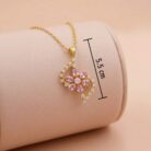 22k gold pendant, floral gold pendant, pink stone pendant, ladies gold pendant, trendy gold pendant, flower pendant design, cz gold pendant, lightweight gold pendant, stylish pendant for women, diamond finish pendant, elegant gold jewellery,