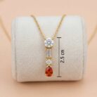 22k gold pendant, gold pendant design, ladies gold pendant, ruby stone pendant, red stone gold pendant, trendy gold pendant, stylish pendant for women, modern gold jewelry, daily wear gold pendant, bridal pendant design, lightweight gold pendant, luxury gold pendant, diamond finish pendant, t
