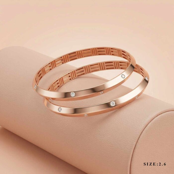 127-26J96----127-26J97--size-2 Two 18k rose gold minimalist bangles with flush-set stones and geometric inner detailing, size 2.6, by OVJ Jewels.